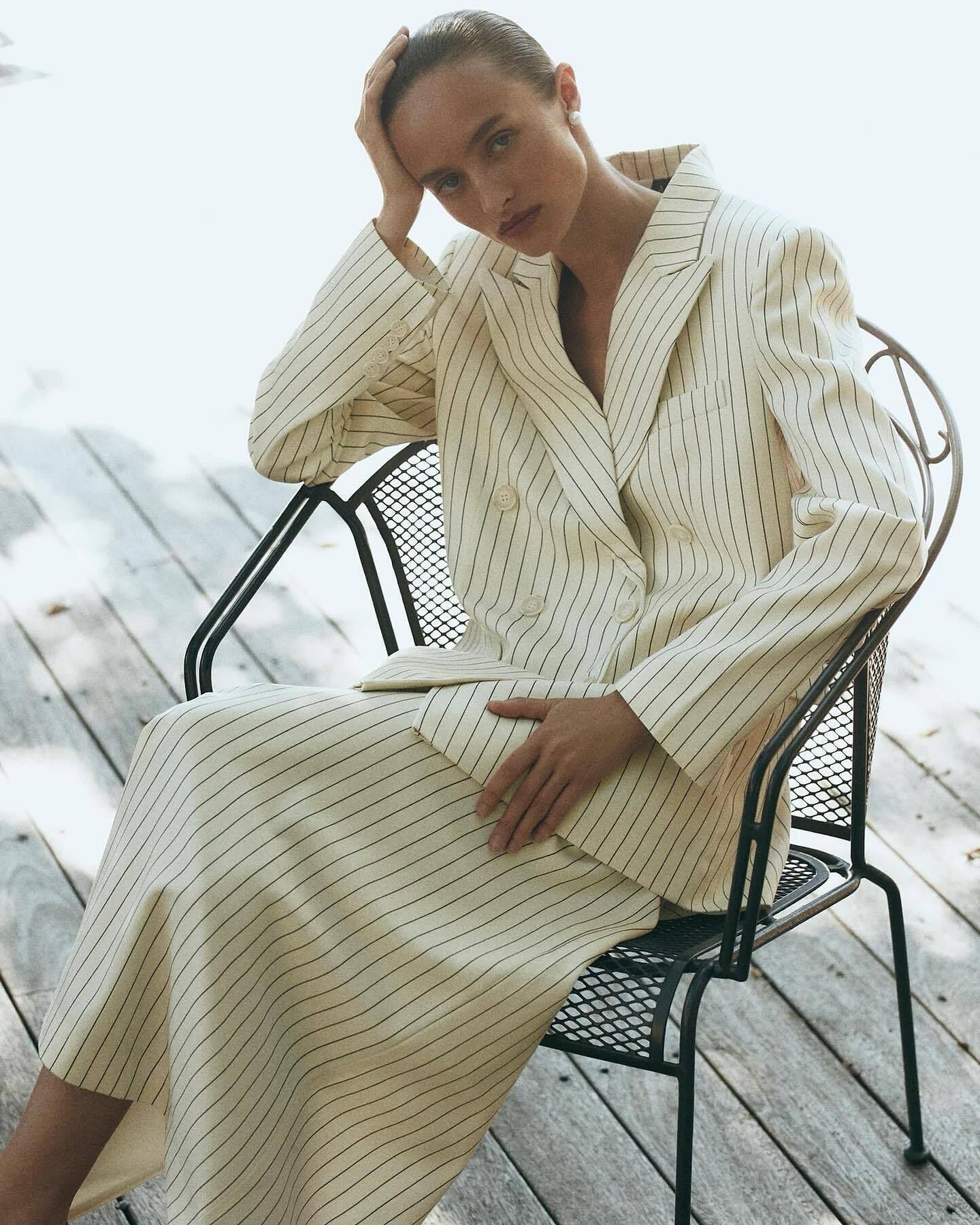 Stepping into the season in style. This pinstriped white suit is the ultimate transitional piece - effortlessly chic and versatile.